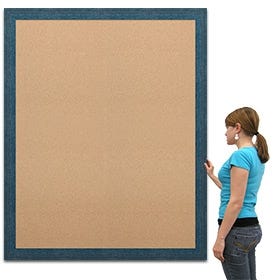 Over-sized cork board with blue washed wood frame