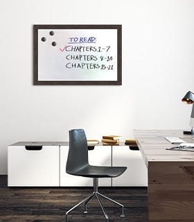 Wood framed magnetic dry erase marker board in environment