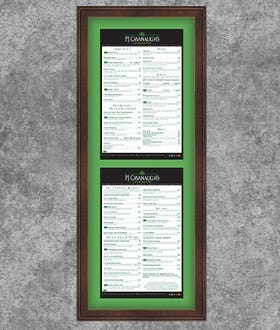 Menu SwingFrame with Wood Frame and Green Mat Against Gray Concrete Wall